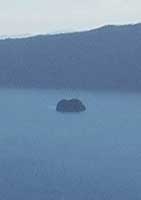 Kamishu island in Lake Mashu